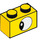 LEGO Yellow Brick 1 x 2 with Eye looking left with Bottom Tube (3004 / 38914)