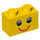 LEGO Gul Kloss 1 x 2 med Smiling Ansikte med Eyelashes med bottenrör (3004 / 89080)